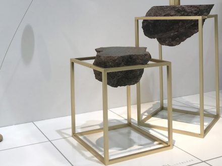 „Antivol“ is a side table made of lava blocks braced in a simple metal frame.