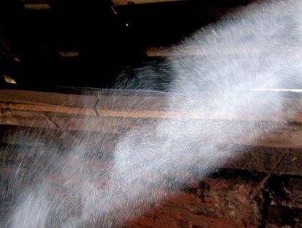Crystalline Silica, much smaller then the dust on the photo, may be a danger unless workers protect themselves.