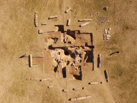 Drone aerial shot of the ancient Turkish ruins on Dongoin shiree. (North at the top.) Segments of the inscriptions and sarcophagus excavated from the hole at the center of the ruins can be seen.
