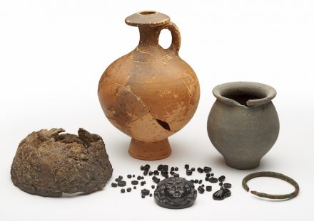 Grave goods from an inhumation with exceptionally fine Jet pendant necklace probably depicting Medusa’s head.