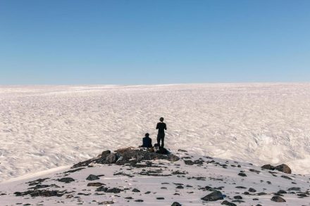Researchers from the Bristol Glaciology Centre look over the vast Greenland Ice Sheet. Photo: Dr. Jon Hawkings, University of Bristol