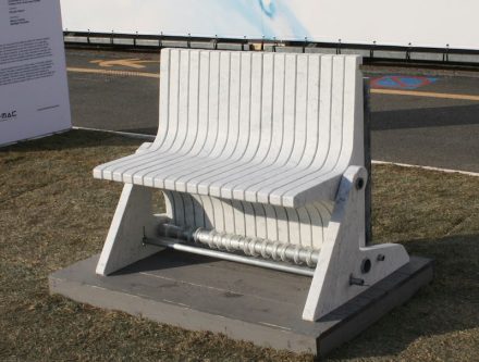 THE COMBO BENCH: The project consists of building a bench made from 5 cm thick slabs of marble, disjoint among themselves through 1 cm spacer. Through a special rotation system, a mechanism to make the slabs rotate 93° has been studied; the slabs can become armrests or tray tables, depending on the number of slabs rotated. The bench has a structural core made of a tubular steel cable running through the slabs in an oval hole. Thanks to the hole the slabs are permitted to be lifted an rotate. To make the rotation easier there is a slot at the back of each slab to place the hand.