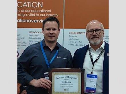 Reid Kubesh, Regional Sales Manager for Coldspring (left), accepts Coldspring’s CEU Educator of the Year Award from Daniel Wood, Natural Stone Institute Education Committee Chair during TISE 2020 in Las Vegas.