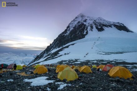 View of the scientists’ tents at Camp IV/South Col. In the background, climbers make their way to the summit. Photo: Mariusz Potocki/National Geographic