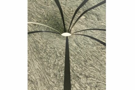 Wormhole. Design: Luca Facchini. Production: Bagnara. Material: Silvercloud, Nero Assoluto Zimbabwe, Bianco Lasa.