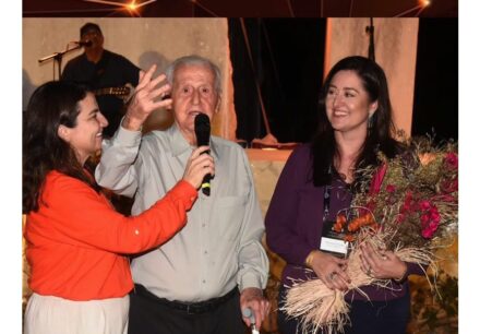 Estevão Marcelino Scaramuzza aged 98, grandfather of Araciene Scaramuzza Pessin (right), honored during a dinner promoted by the University of Marmoraria, inside a white marble quarry, in the mountain range that marks the effective beginning of the stone sector.