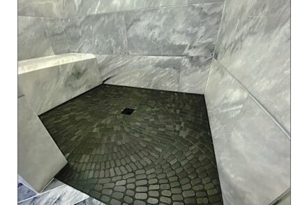 CID Award, winner Residential Stone Installation - Small Budget: Modern Yet Timeless Bathroom Remodel; Footprint Wood & Stone, Lakeville, Minn.