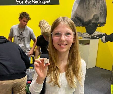 Teenager with her cube.