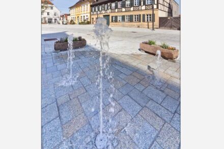Marketplace in Hallstadt near Bamberg, pavement with several granites and fountain. Photo: Bamberger Natursteinwerk