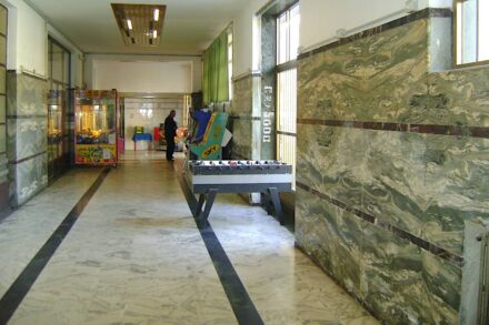 Railway station in Viareggio (1955) with Cipollino Classico together with Rosso Levanto and other marbles.