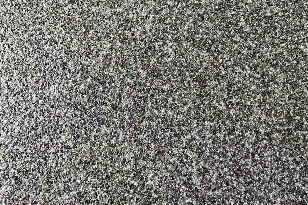 SESAME BLACK, a very hard granite, with low water absorption, resistant to wear and tear, quarried by Dalian Yusheng in Liaoning Province, China