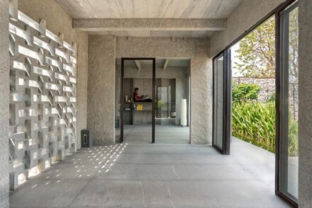 “Interlocking Stone House” by Play Architecture.