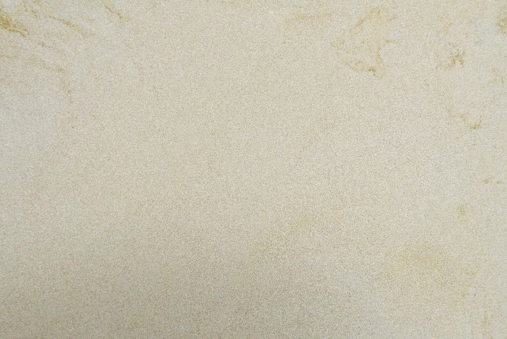 Sandstone PERLA, a fine-grained, consistent light buff colored calcarenite, with a pearlescent appearance, quarried by Rubio Stone in Northern Spain