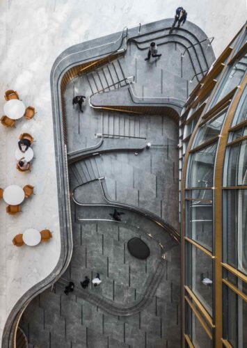 2100 Pennsylvania Avenue, Washington, DC. Design Architect: Pelli Clarke & Partners; Architect of Record: WDG Architecture, PLLC; Stone Supplier: AKDO Intertrade; Stone Supplier: Lorton Stone, LLC; Stone used: Dark Olive marble.