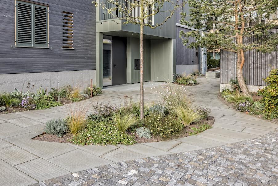 Natural stone characterizes the outdoor areas.
