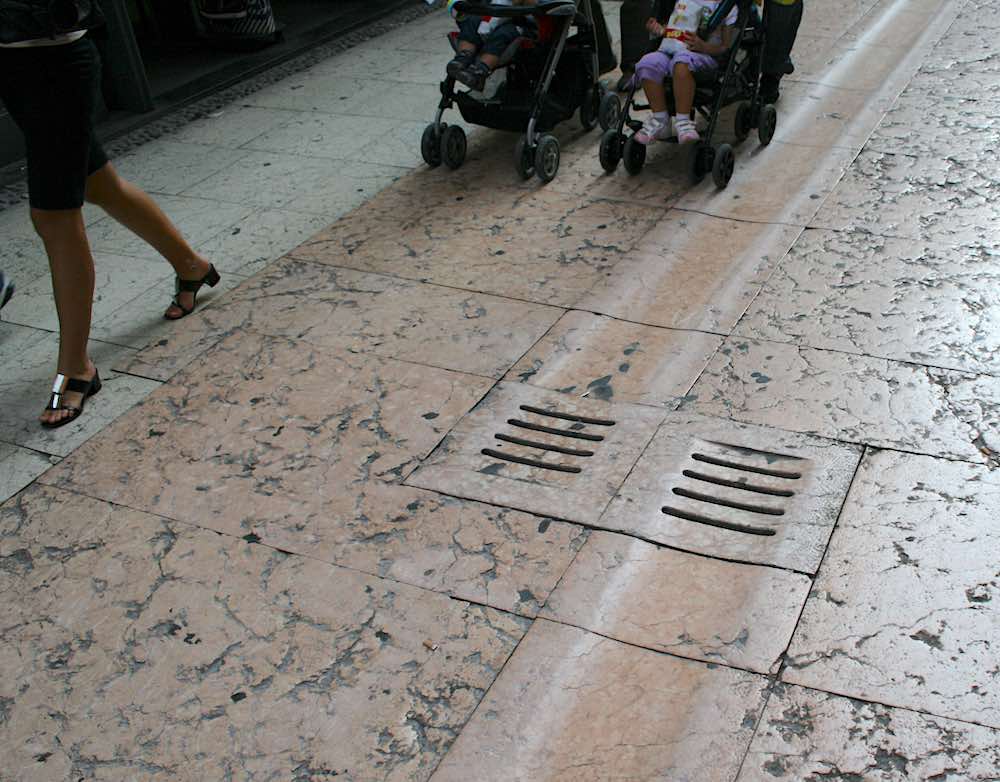 Street paving with Rossa Verona in the historic city center.