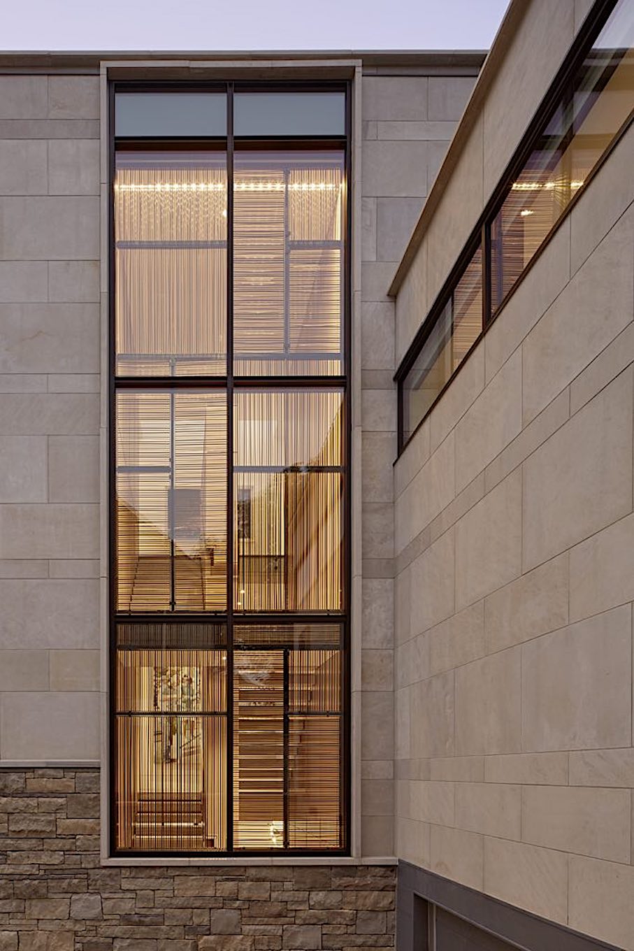 Natural stone façade by Michael Taylor architecture + design.