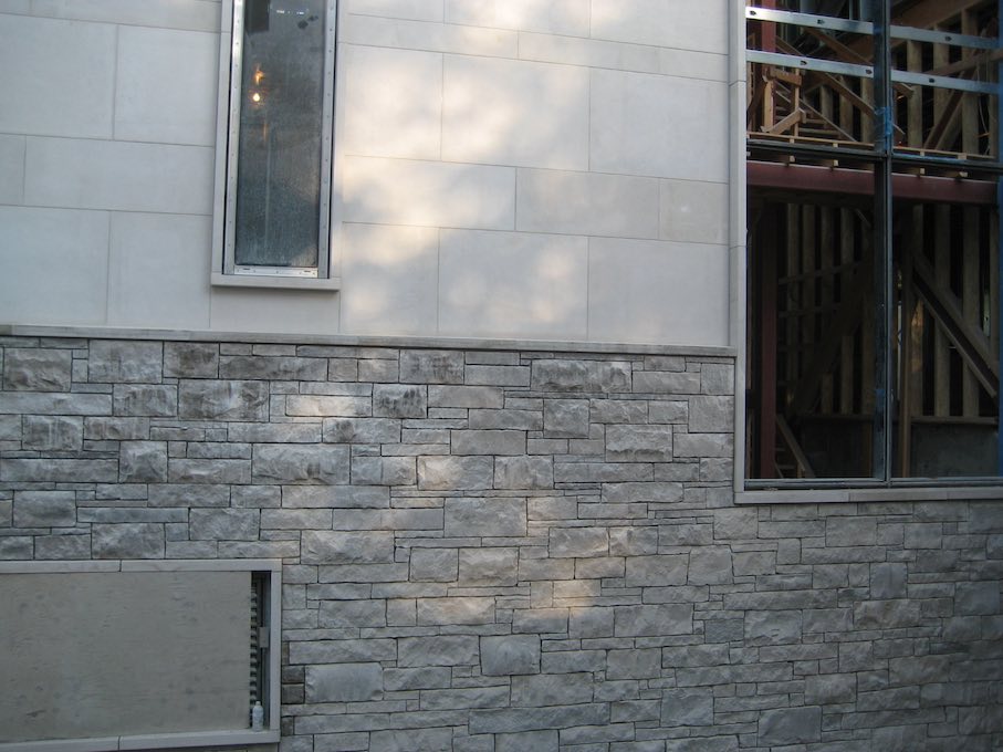 Natural stone façade by Michael Taylor architecture + design.
