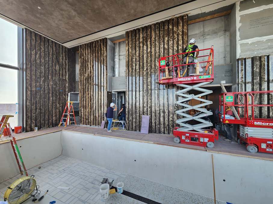 CID Awards, Special Recognition, Residential Stone Installation: The Greenwich – Marble Feature Walls. Company: Stonework Tile + Stone, New York, N.Y.